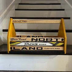 some baseball bats are sitting on the stairs