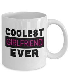 a white coffee mug with the words coolest girlfriend ever printed in pink and black