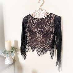 Guess Lace Long-Sleeve Cropped Top. Condition: New (Without Tag) - Never Used! Color: Black / Nude Content: 100% Nylon Long Sleeve Lace Top For Night Out, Elegant Long Sleeve Crop Top For Date Night, Chic Crew Neck Lace Top For Fall, Chic Lace Crew Neck Top For Fall, Long Sleeve Crop Top With Lace Trim For Party, Long Sleeve Lace Crop Top For Party, Long Sleeve Lace Trim Crop Top For Party, Lace Long Sleeve Top For Night Out, Elegant Long Sleeve Lace Crop Top