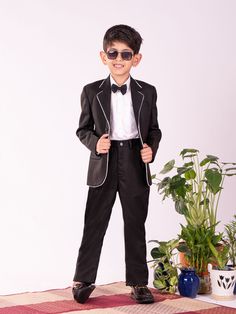 VASTRAMAY Boys' White And Black Shirt Blazer And Pant Get your young one ready for any special occasion with this stylish VASTRAMAY outfit. This set includes a white shirt, a black blazer, and matching pants, creating a smart and sophisticated look. The shirt features a classic collar and button-down front, while the blazer adds a touch of elegance with its tailored design. The pants complete the outfit with a comfortable fit and a versatile black color. Features: Stylish and sophisticated outfi Outfit For Boys, Design Pants, Boys Wear, Tailored Design, Matching Pants, Pant Shirt, Black Blazer, White Shirt, Boy Outfits