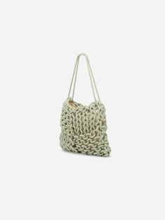 The Dora Bag is hand woven in Italy with organic rope for the optimal shoulder bag. Organic Cotton Lining:. drawstring closure . inside pocket . size: h 33 x w 31 cm CARE INSTRUCTIONS. 100% organic cotton . dry clean Everyday Braided Bucket Tote Bag, Everyday Braided Tote Bucket Bag, Woven Cotton Shoulder Bag For Spring, Spring Woven Cotton Shoulder Bag, Spring Cotton Woven Shoulder Bag, Beige Cotton Bag With Braided Handles, Eco-friendly Cotton Shoulder Bag With Braided Handles, Chic Beige Cotton Bag With Braided Handles, Eco-friendly Everyday Braided Shoulder Bag