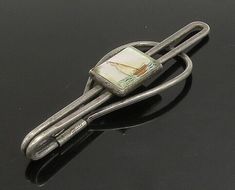 "925 Sterling Silver - Vintage Mother Of Pearl Dark Tone Tie Clip - TR3182  Jewelry Type:         Other   Metal Type:            925 Silver  Metal Size:             2.5\"  Stone Type:            Mother Of Pearl   Condition:              N/A  Jewelry Weight:     7.2 Grams  PLEASE NOTE: THIS ITEM IS PRE-OWNED. ALTHOUGH MOST ITEMS ARE IN VERY GOOD CONDITION, SOME MAY NEED CLEANING AND/OR MINOR REPAIRS. WE MAKE A VERY STRONG EFFORT TO UPLOAD CLEAR PICTURES. PLEASE INSPECT ALL PICTURES AND ASK ALL QUESTIONS YOU MAY HAVE PRIOR TO MAKING A PURCHASE. NOT ALL STONES ARE GENUINE, SOME ARE ENHANCED OR CREATED." Clear Pictures, Tie Clip, Types Of Metal, Beautiful Rings, Mother Of Pearl, Metallic Silver, 925 Silver, Size 2, 925 Sterling Silver