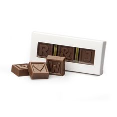 three pieces of chocolate sitting next to each other