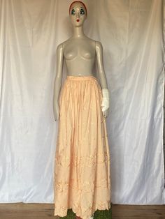 "This gorgeous and full vintage maxi skirt comes in a standout light beach and features embroidery all the way down the skirt . It fastens at the back with a hidden zip and matching peach beach button. Measurements      Waist 26\"     Hips 46\"   Length  40\"  Skirt   84\"    At The Yesterday Society, we pride ourselves on the quality of the grade A vintage items in our collection. All listings are in first class condition unless otherwise stated. Check out these similar items https://etsy.me/3p Floral Embroidered Full Skirt For Spring, Spring Floor-length Lined Skirt, Flowy Full Skirt With Floral Embroidery, Spring Floral Embroidery Maxi Skirt, Floral Embroidered Full Skirt For Summer, Full Length Spring Vacation Skirt, Summer Floor-length Lined Maxi Skirt, Floral Embroidered Full Skirt Bottoms, Spring Floral Embroidered Maxi Skirt