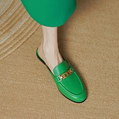 Handmade from premium leather. these loafer mules are really comfortable and breathable. Boasting chain decoration. these green mules help you show an easy chic look. Upper: Genuine Leather Lining: Genuine Leather Outsole: TPR Toe: Round Toe Closure: Slip on Color: White. Royal Blue. White is_handmade: Yes Green Leather Loafers For Summer, Elegant Green Slip-on Mules, Green Slip-on Mules, Green Slip-ons With Flat Heel For Spring, Spring Green Slip-ons With Flat Heel, Green Slip-on Loafers For Office, Green Slip-on Loafers For Work, Green Slip-on Loafers For Spring, Spring Green Slip-on Loafers