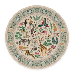 a plate with various animals and plants on the front, including giraffes