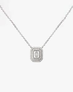 - Princess cut gemstone with Surrounding round cut stones Necklace- Made in Sterling silver set with a high-quality Cubic Zirconia. - Stone size: Princess cut 5.00 x 7.00 mm, Round cut 1.10 mm- Size : 12 x 14 mm ( 0.47 x 0.55 inch )- Chain length : 16 inch Sterling silver925 Sterling Silver is an alloy made of 92.5% pure silver and 7.5% copper. We plate our silver jewelry in rhodium, which gives it extra shine and durability. Rhodium is one of the costliest precious metals due to its rarity.Care Timeless Silver Diamond Cut Necklace, Elegant Silver Solitaire Necklace With Single Cut Diamonds, Silver Diamond Necklace With Round Cut, Exquisite Silver Diamond Cut Diamond Necklace, Exquisite Silver Diamond Cut Necklace, Exquisite Silver Diamond Necklace With Diamond Cut, Timeless Silver Jewelry With Lab Grown Diamonds, Silver Jewelry With Single Cut Round Diamonds, Timeless Silver Jewelry With Single Cut Diamonds