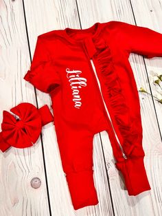 "**Listing details ** This is an adorable custom made solid red footies romper with matching solid red headband. Size Chart Newborn 17.5-18\" length (7lb-9lb) 0-3mo (19.5-20\" length) (9lb-13lbs) 3-6mo (20\"-21\" length)(13lbs-18lbs) 6-12mo (22-23\" length) (18lbs-21lbs 12-18mo (24\"-25\" length) (21lbs-25lbs) You can add personalization at check out Name is made from a vinyl cut machine See color of Vinyl to choose from below for name This has built in mittens and footies that fold over for cov Newborn Christmas Outfit, My First Christmas Outfit, Red Headband, Newborn Christmas, Red Romper, 4th Of July Outfits, Valentines Outfits, Newborn Outfit, Vinyl Cut