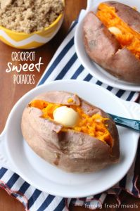 two baked sweet potatoes sitting on plates with spoons next to them and a bowl of oatmeal in the background