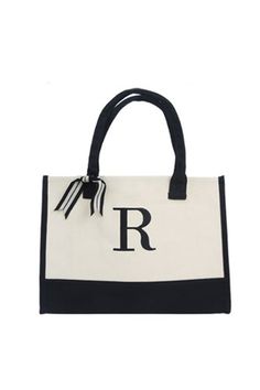 - Canvas Tote Bag- Embroidered Initial: R- Bow Detail- Two Short Handles- Great for everyday use- Measurements: 17" x 19" x 2"- 100% Cotton Tan Monogram Travel Bag, Tan Travel Bag With Monogram, Rectangular Canvas Shopping Bag With Embroidered Logo, Rectangular Canvas Bag With Embroidered Logo For Shopping, Tan Monogram Bag, Black Canvas Bag With Embroidered Logo, Everyday Black Shoulder Bag With Embroidered Logo, Black Rectangular Bag With Embroidered Logo, Black Monogram Bags For Everyday Use