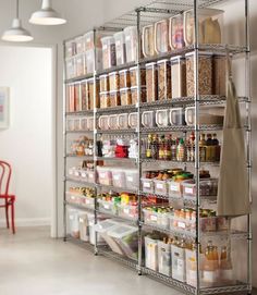 a metal shelving unit filled with lots of food