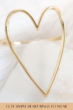 These gold heart shaped rings are simple to throw on with any outfit. The design is simple and fits for any occasion. We have both metals of gold or sterling silver. Shop now at LoveStylize.com! Accessories Rings, Heart Of Gold, Rose Gold Ring, Stone Rings, Ring Designs