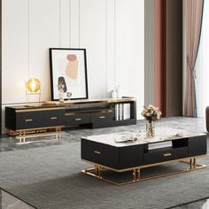 an elegant living room with black and gold furniture, coffee table and art work on the wall