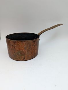 This amazing  vintage copper pot is approx 6 inches in diameter without handle. 13.5 inches long including the handle Just look at that aged patina heavy handle They would be a perfect addition to your English Country, country french, craftsman ,industrial modern or cottage style decor.  Nice aged patina all around  larger heavy copper pot  Vintage copper kichenware Wonderful display pieces on a shelf, on a wall or to use . Copper with silver interior Wonderful patina on this piece. I have not it at all as  many prefer the aged patina .     Great in a kitchen on a wall, display or for use  Great condition  It  looks fine on display,  Heavy Copper  metal     *Due to the nature of vintage, there might be the occasional imperfection. I will do my best to describe any noticeable flaws. Althoug French Craftsman, Vintage Copper Pots, Cottage Style Decor, Copper Pots, Industrial Modern, Country French, Kitchen Decor Items, Copper Metal, Staten Island