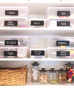 an organized pantry with labeled labels and bins