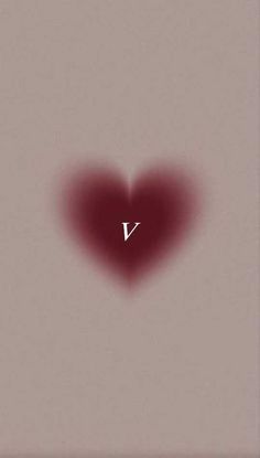 a heart shaped object with the word v on it