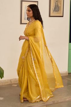 Yellow sheer woven textured saree with marori embroidered butti patterns and pleated lace border. Comes with blouse. - Aza Fashions Traditional V-neck Sets With Zari Work, Festive Chanderi V-neck Kurta, Unstitched V-neck Traditional Wear For Diwali, Semi-stitched Traditional Wear With V-neck, Wedding Dupatta With Zari Work, Traditional Semi-stitched V-neck Wear, Semi-stitched Traditional V-neck Wear, Traditional V-neck Blouse With Zari Work, Festive V-neck Traditional Wear For Eid