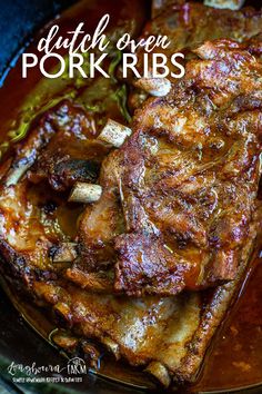 pork ribs covered in gravy and sauce on a plate with the words dutch oven pork ribs