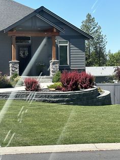 a house with landscaping in the front yard