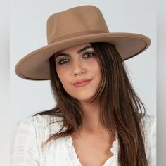 Their Bestselling Vegan Felt Rancher Hat. Get This Classic Statement Hat To Spruce Up Your Look! Sold In A Wide Assortment Of Colors, Shop Limited Edition And More! Adjustable Inner Drawstring 100% Polyester Size: Brim: 3.75 In. Crown Height: 4 In. Chic Fitted Beige Fedora, Chic Beige Fedora For Fall, Elegant Fedora For Fall, Chic Fedora For Spring, Beige Wide Brim Boater Hat For Fall, Chic Fitted Boater Hat For Fall, Classic Beige Fedora, One Size Fits Most, Chic Beige Hat One Size Fits Most, Brown Fedora One Size Fits Most