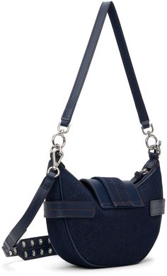 Recycled cotton denim shoulder bag in navy. · Buffed leather trim throughout · Detachable shoulder strap · Detachable and adjustable crossbody strap · Logo hardware at face · Pin-buckle tab at press-stud flap · Zip closure · Card slot at interior · Taffeta lining · Contrast stitching in tan · H5.5 x W9 x D2 Supplier color: Dark navy Denim Shoulder Bag, Denim Shoulder Bags, Small Shoulder Bag, Press Studs, Contrast Stitch, Crossbody Strap, Leather Trim, Recycled Cotton, Dark Navy