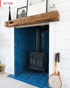 there is a wood burning stove in the room with blue tiles on the walls and floor