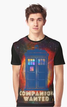 a man wearing a t - shirt with the doctor who is in space on it