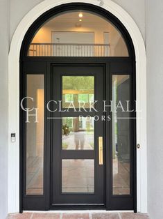 the entrance to a building with glass doors