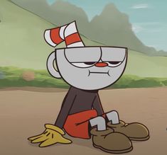 a cartoon character sitting on the ground