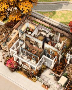 an aerial view of a house in the middle of autumn