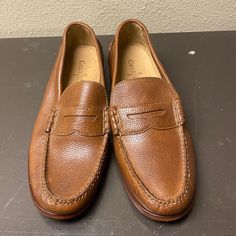 For Sale Is A Pair Of Unworn Cole Haan Penny Loafers In Mens Size 8.5. They Have A Bit Of Storage Marks On The Sole, But Are Essentially Mint Condition. Offers Are Welcome. Thanks For Looking! Casual Wingtip Slip-ons With Brogue Detailing, Casual Wingtip Slip-ons For Business, Casual Slip-on Wingtip Dress Shoes, Casual Slip-on Loafers With Brogue Detailing, Casual Brogue Dress Shoes With Moc Toe, Casual Slip-ons With Brogue Detailing, Casual Dress Shoes With Stitched Sole For Business Casual, Casual Wingtip Slip-ons With Leather Footbed, Casual Wingtip Moccasins For Spring