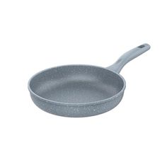 an empty frying pan on a white background