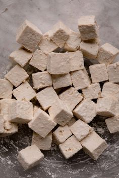 cubes of tofu in a glass bowl