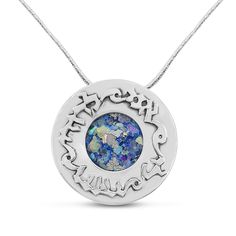 "A very special piece of jewelry, including a necklace, a silver centerpiece and a Silver inscription , set with an authentic shred of Roman glass. The inscription depicts the Hebrew biblical inscription \"Ani L'dodi V'dodi Li\" (Song of Songs 6:3), meaning: \"I am my beloved's and my beloved is mine\". Especially suitable inscription for a couple's gift. The outer border of the centerpiece is textured to give the piece another artistic dimension. The pendant makes a wonderful gift item that wil Silver Star Of David Necklace For Formal Occasions, Formal Silver Star Of David Necklace, Silver Gemstone Necklace For Celebration, Gemstone Necklace With Round Pendant For Celebration, Silver Custom Necklace For Wedding, Silver Star Of David Necklace With Gemstone, Sterling Silver Star Of David Amulet Necklace, Fusion Round Necklace With Polished Finish, Spiritual Polished Wedding Necklaces