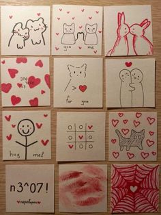 some drawings on paper with hearts and animals