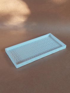 a white tray sitting on top of a table