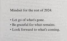 an open book with the text mindset for the rest of 2012 let go of what's gone be grateful for what remains look forward to what's coming