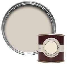 a white paint with a brown tin on the side and a red can next to it