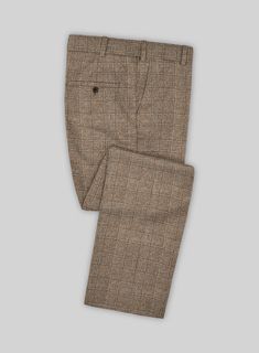 Dress up the subtly hallmarks of elegance by adding our Loro Piana Caralo Alpaca Wool Pants. However, crafted from a prosperous blend of alpaca and wool fabrics that offers a soft, comfy, bringing snug feeling with a checks pattern over brown hues. Finally, Complementing the exquisite touches of luxury with accurately tailored pants that flaunt the sharp cuts leads to a versatile option that grants a contoured silhouette to make stellar investments for various occasions.  Choice of the Elite, Lo Elegant Wool Bottoms For Winter, Elegant Wool Pants For Winter, Elegant Fitted Tweed Bottoms, Elegant Wool Beige Bottoms, Elegant Beige Wool Bottoms, Beige Wool Bottoms With Welt Pockets, Classic Brown Winter Pants, Elegant Winter Pants With Welt Pockets, Brown Wool Straight Pants