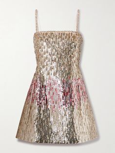 Valentino Garavani's dress is covered with sequins that give it a liquid-like shine and will reflect light from all angles - look closely and you can see they're interspersed with crystals and beads, too. Suspended from slender straps, it's been made in Italy from wool and silk-blend crepe that nips in at the waist before kicking out to an A-line skirt. Floral Dresses Short, Mini Robes, Embellished Dress, Gold Dress, Dream Dress, A Line Skirt, Net A Porter, Valentino Garavani, Pretty Dresses