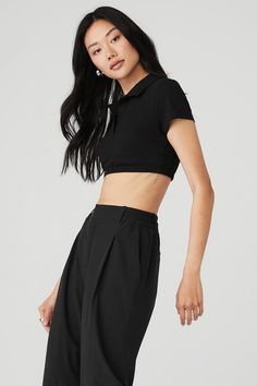 Give off the ultimate prep school chic vibes in the Cropped Prestige Polo. Its super-cropped, fitted silhouette will get you cool points at yoga class and with all your friends when you sport it for your next outing. Pair it with any high-waist bottom in your collection. Super-cropped, fitted silhouette Button-up with cool collar Designed & uniquely fit to flatter every size Wear-tested by our in-house team for the perfect fit Chic Cropped Tops For Streetwear, Black Fitted Athleisure Crop Top, Versatile Fitted Black Crop Top, Casual Cropped Activewear For Streetwear, Black Athleisure Crop Top Activewear, Fitted Alo Yoga Crop Top, Trendy Alo Yoga Tops, Alo Yoga Stretch Crop Top, Casual Fitted Crop Top Activewear