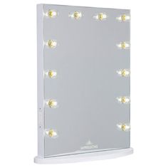 a white lighted mirror with multiple lights on it