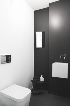 a black and white photo of a bathroom