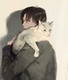 a man holding a white cat in his arms