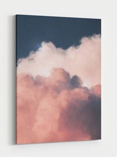 the sky is filled with pink clouds in this photo canvas wall art print on a white wall