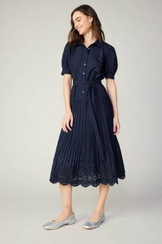 Framed by puffed sleeves, this midi dress has a pointed collar and a button-up half placket that lets you control the coverage. It's got crisp pleats that flow to a mid-length skirt with embroidered eyelets and a scalloped hem. Wear it cinched by the matching tie belt to highlight your waist. •Pointed collar •Button front placket •Short puff sleeves •Partially smocked cuffs •Optional tie belt ��•Pleated skirt •Scalloped mid-length hemDIMENSIONS •Standard: 48" Length Item number 2490204 65% POLYEST Eyelet Midi Dress, Mid Length Skirts, Print Trends, Eyelet Dress, Sweater Sale, Puffed Sleeves, Scalloped Hem, Trending Dresses, Sweater Blouse