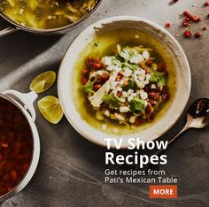 two bowls filled with soup and garnished with cilantro, limes, beans, and other ingredients