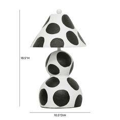 a black and white polka dot lamp with a shade on the top, and measurements for it