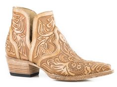 Stetson Ladies Aviana Snip Toe Booties Slip in effortlessly into a sense of confidence and cowgirl style. Handcrafted by Stetson's legendary bootmakers from premium leather designed to patina handsomely over time. Features include: premium leather lining, cushioned insoles, premium brass nails and hand-driven lemonwood pegs that enable the boot to withstand the elements by expanding and contracting with any moisture the boot may encounter. Each pair is stitched and tooled by hand to ensure absolute comfort and performance. A classic addition to any wardrobe, these boots are a fitting companion for anyone with a strong appreciation for objects that are made well and get better with age. Features: 4" Open Side Shaft Hand-Tooled Design on Vamp and Shaft Single Welted All Leather Construction Western Ankle-high Boots With Heel Pull Tab, Western Style Ankle-high Chelsea Boots With Leather Sole, Western Closed Toe Boots For Ranch, Western Style Closed Toe Boots For Ranch, Western Leather Snip Toe Booties, Western Leather Booties With Snip Toe, Hand Tooled Boots For Ranch In Fall, Western Style Leather Sole Booties For Fall, Western Heeled Boots With Stacked Heel