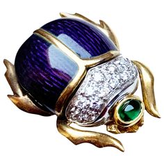 This beautiful brooch in 18 Kt gold, enamels, diamonds and emerald, which depicts a scarab, was made by a talented Italian goldsmith Over the history and religious beliefs surrounding the Scarab Symbol which was one of the most important religious Egyptian Symbols in the mythology of ancient Egypt. In ancient Egyptian religion the scarab was a symbol of immortality, resurrection, transformation and protection When the eggs hatched the scarab beetle would seem to appear from nowhere, making it a Scarab Symbol, Ancient Egyptian Jewelry, Egyptian Scarab, Scarab Beetle, Egyptian Symbols, Insect Jewelry, Egyptian Jewelry, Diamond Brooch, Gold Brooches